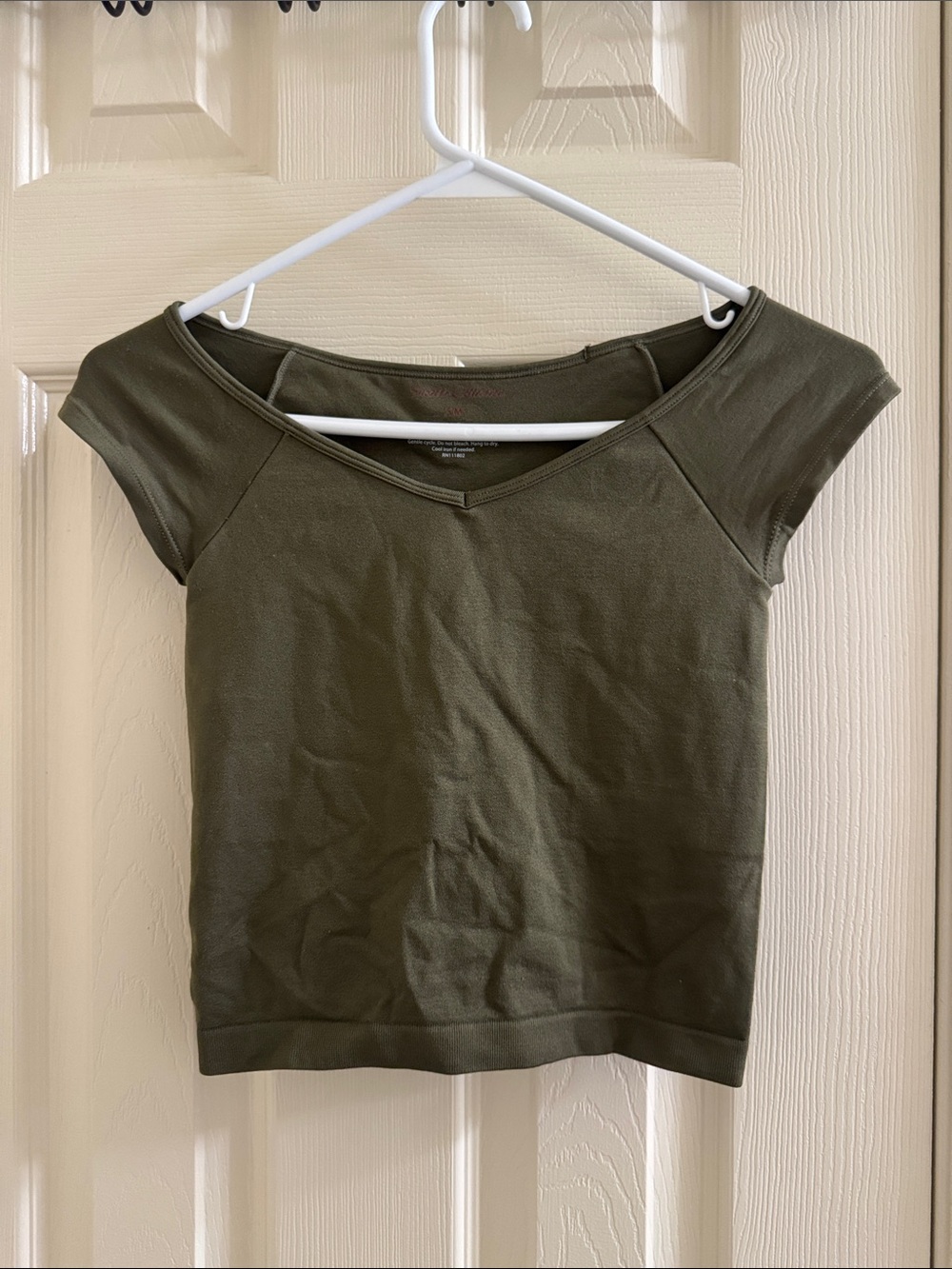 Stretchy off the shoulder green tee shirt